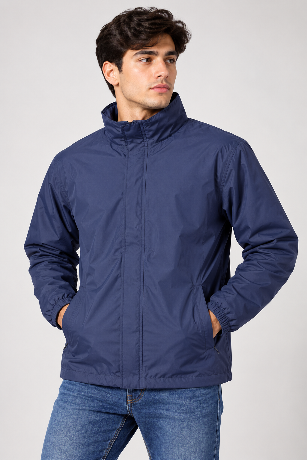 Peter Storm men’s navy blue lightweight windbreaker jacket in UK Size M. Practical outdoor styling with zip fastening, high collar and pockets.