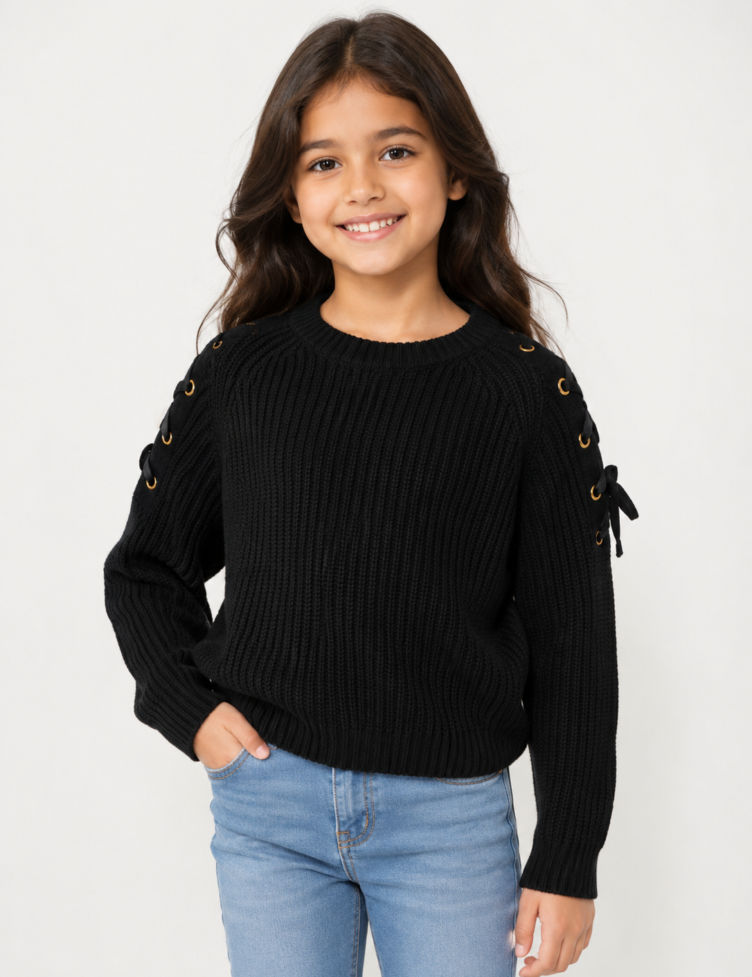  Primark girls' black ribbed knit sweater in UK size 8-9 years. Stylish gold eyelet lace-up sleeve detail, cosy design and perfect for everyday wear.