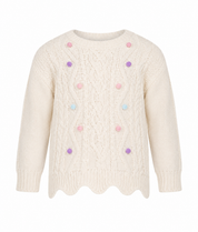  Primark girls’ cream cable knit sweater with pastel pom-pom details, long sleeves and scalloped hem. UK size 3-4 years.