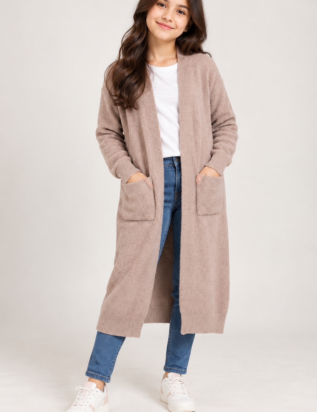 PRIMARK Girls Longline Teddy Knit Cardigan in UK Size S. Soft beige open-front design with long sleeves and front pockets, perfect for cosy layering.