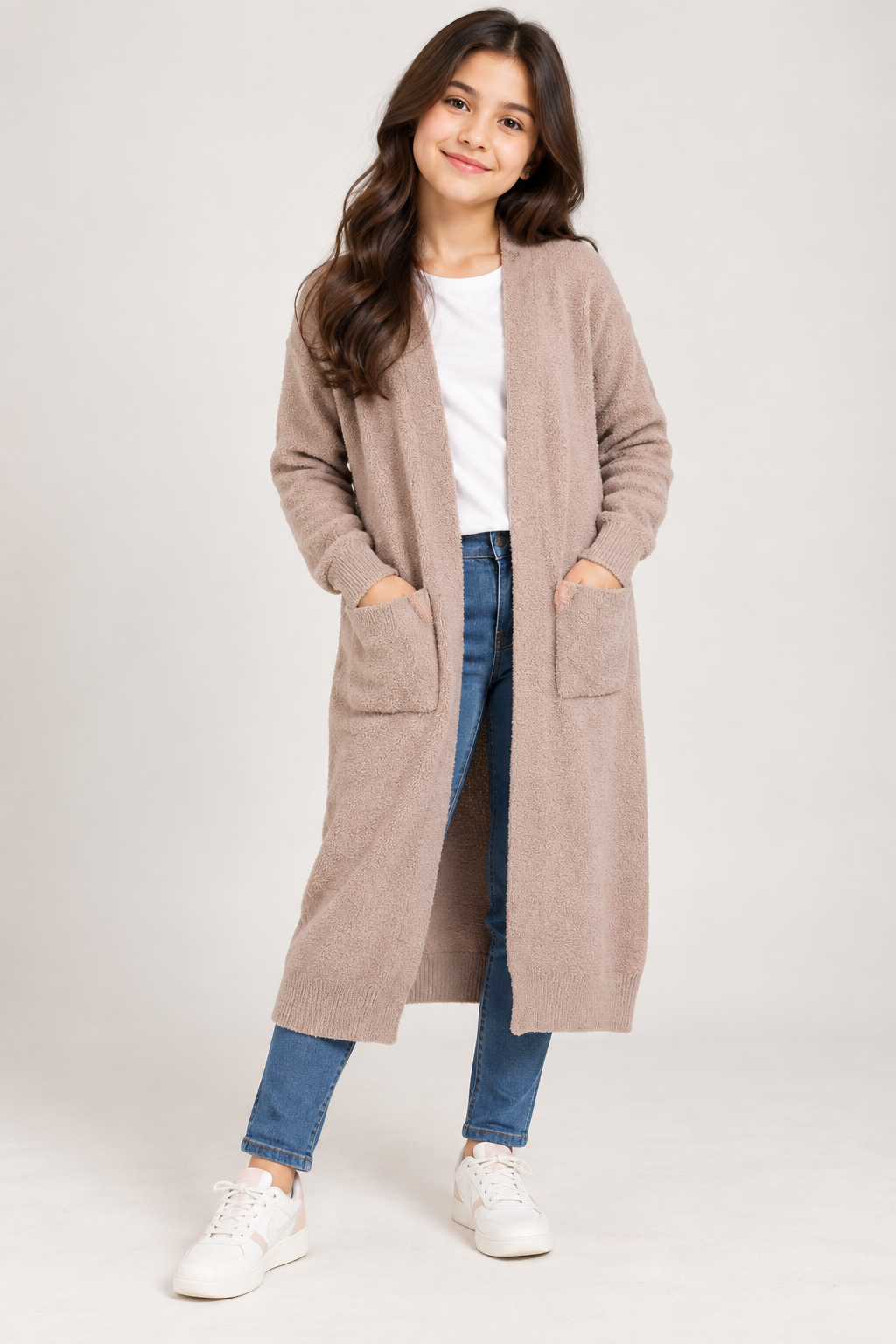 PRIMARK Girls Longline Teddy Knit Cardigan in UK Size S. Soft beige open-front design with long sleeves and front pockets, perfect for cosy layering.