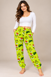  Primark Women's Grinch Christmas Pyjama Joggers in Lime Green, UK Size L. Festive printed lounge trousers with elastic waist and cuffed ankles.