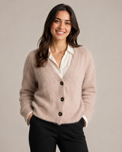 PRIMARK Women’s Fuzzy Knit Cardigan in a soft beige-pink shade. Featuring a V-neck, button front and cozy textured knit, perfect for smart and casual outfits.