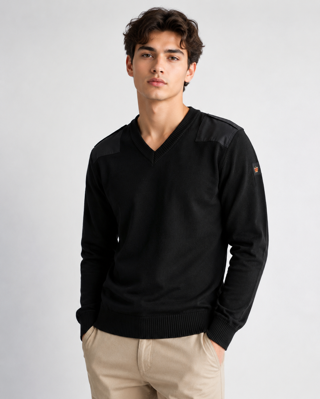  ReServed black V-neck knit sweater for men in UK size M. Stylish long-sleeve design with ribbed cuffs, classic fit and versatile everyday styling.