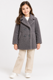 Reserved Labels girls grey teddy fleece coat in UK size 7 years. Soft, cosy and stylish with a double-breasted front, collar and pockets.