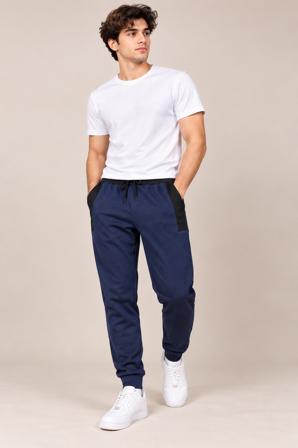  ReServed LABELS Men’s Navy Blue Jogger Pants in UK Size M. Comfortable tapered joggers with black contrast panels, drawstring waist and ribbed cuffs.