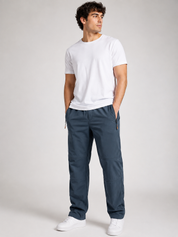  ReServed LABELS Men’s Dark Blue Technical Utility Trousers, UK Size 38 featuring zipped pockets, reinforced knee panels and a practical straight-leg fit.