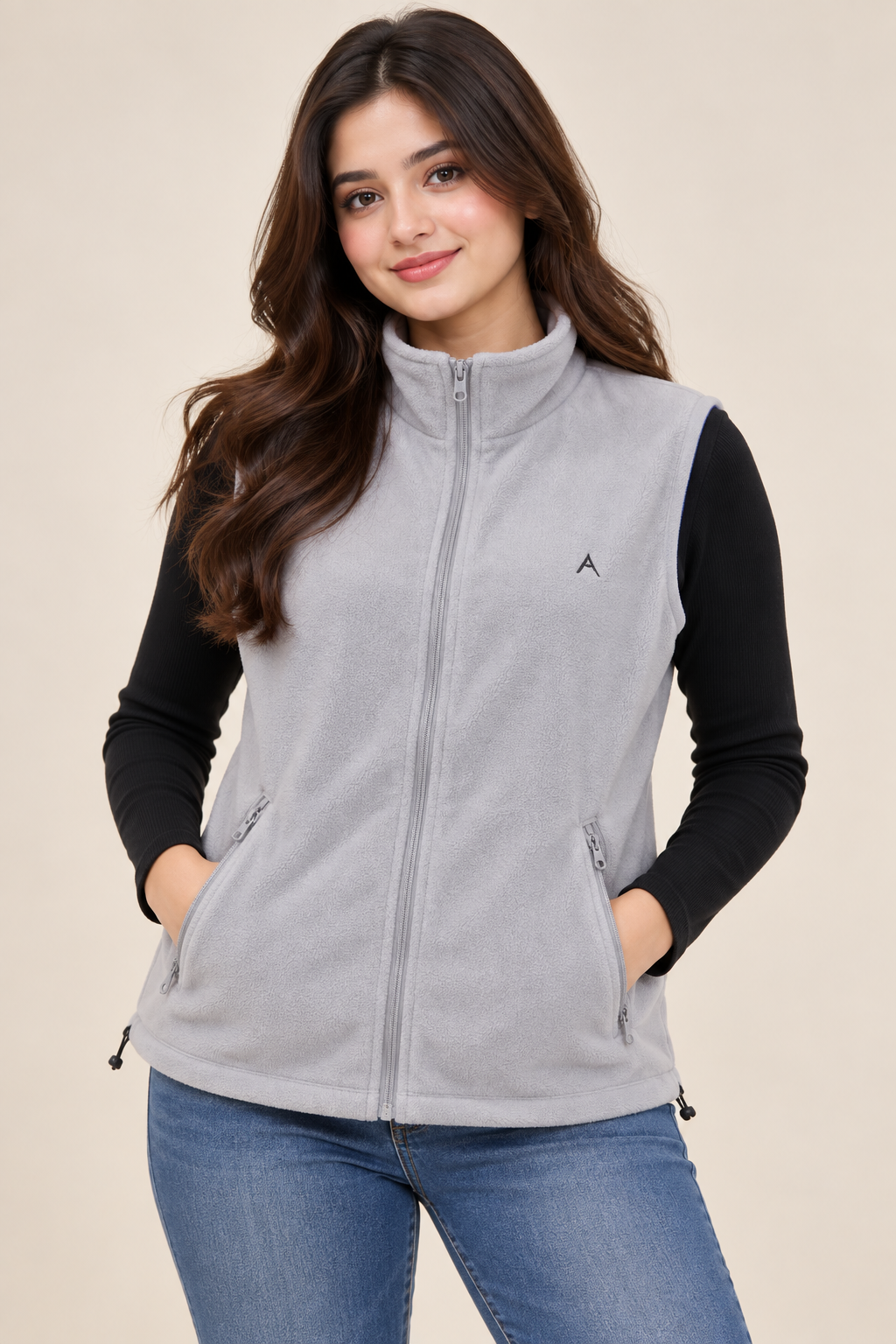 ReServed Labels women’s light grey fleece vest in UK Size M. Soft sleeveless zip-up gilet with high collar and zip pockets for comfortable layering.