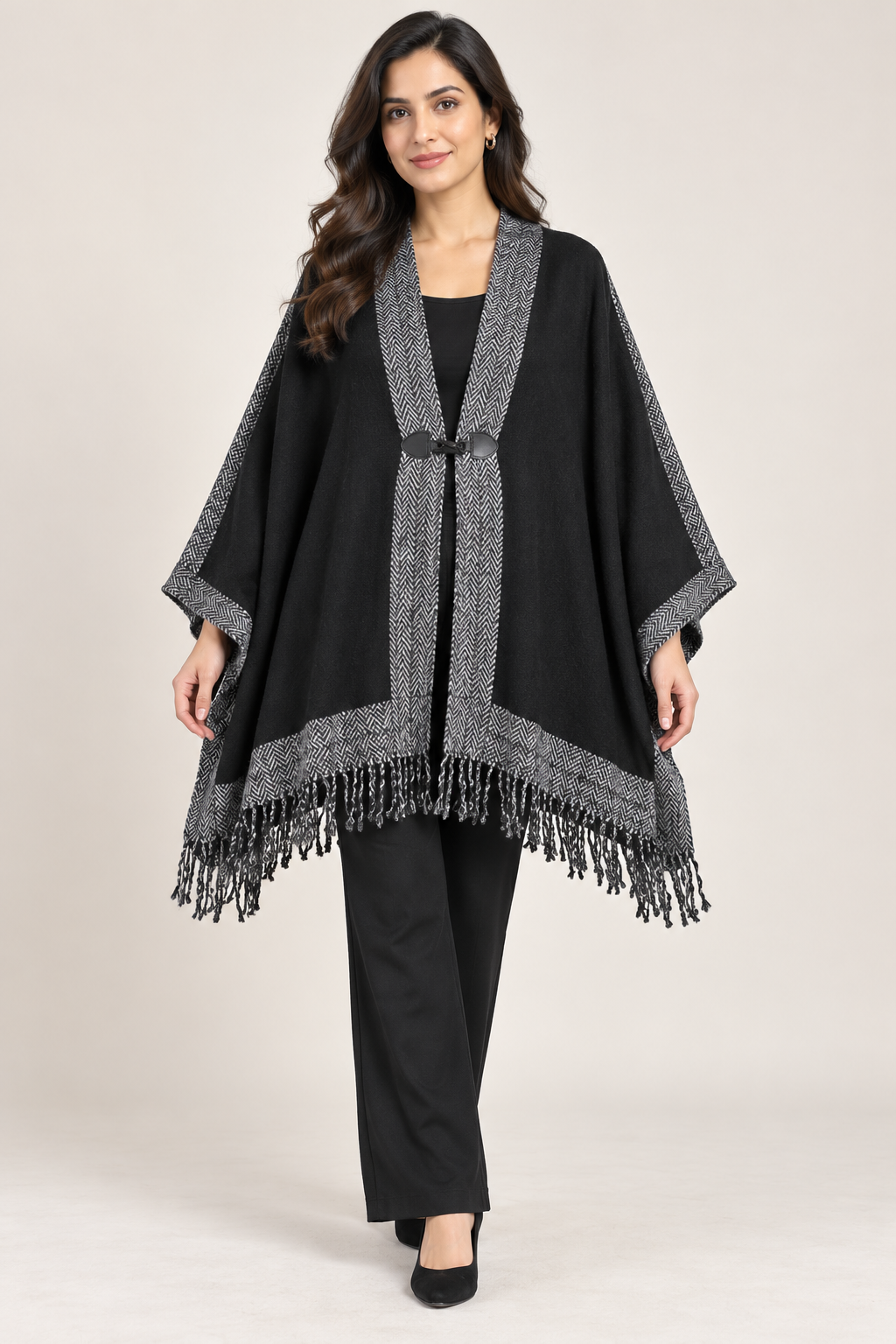  ReServed LABELS women’s black cape shawl in UK L, featuring grey herringbone trim, a toggle fastening and a fringed hem for elegant layering.