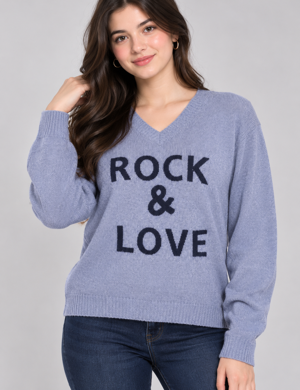   ReServed LABELS women’s blue “Rock & Love” V-neck knit jumper in UK size L. Stylish long-sleeve design with bold lettering and comfortable casual fit.