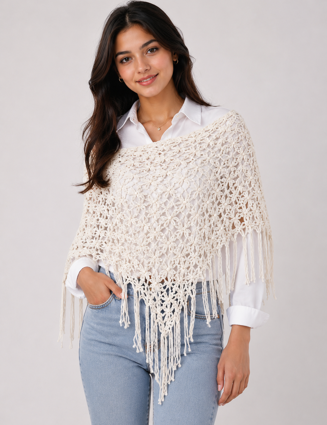  ReServed LABELS women’s cream crochet poncho, UK size L, featuring an elegant open-knit floral pattern and long fringe detailing.
