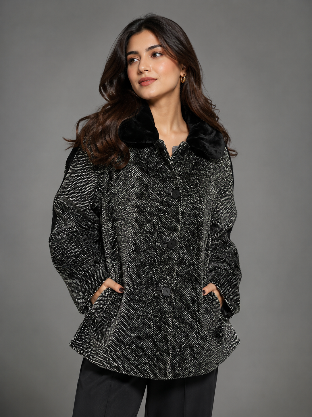  women’s black and white tweed coat with soft black collar, button fastening and stylish flared fit. UK Size L. Ideal for smart-casual outfits.