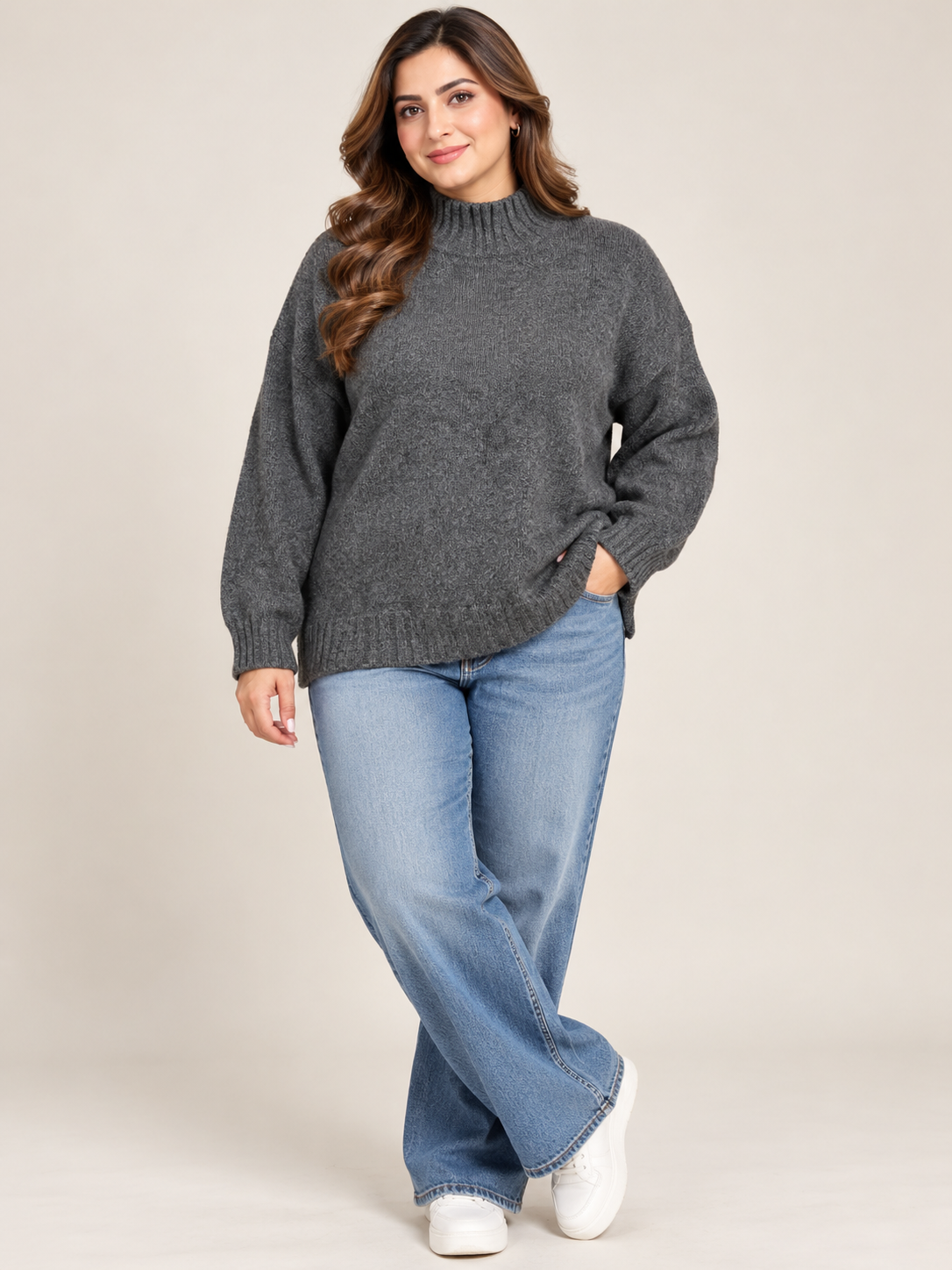 Rita Ora women's charcoal grey high neck knitted jumper in UK size M. Relaxed fit, ribbed cuffs, 25-inch chest and 25-inch length. Shop now!