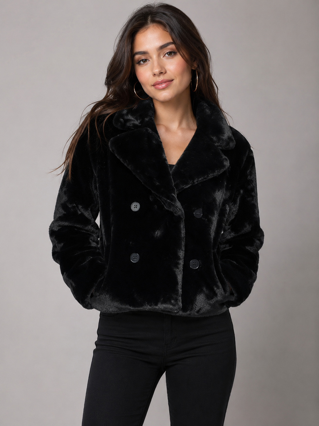  Select Women’s Black Faux Fur Coat in UK Size M. Stylish double-breasted design with a soft plush finish, wide collar and cosy winter appeals.