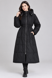 the SHEIN Women’s Black Longline Quilted Puffer Coat in UK 4XL. Hooded padded design with full zip and adjustable waist, ideal for stylish winter wear.