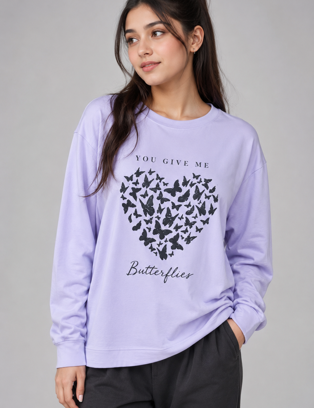 14. Stylish crew neck design with long sleeves and a beautiful butterfly-heart graphic.