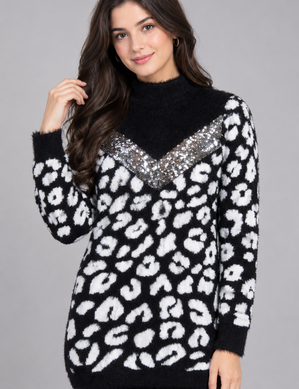 Studio women’s black and white fuzzy knit jumper dress in UK L, featuring a bold leopard print, cosy long sleeves, turtleneck and sparkling sequin V detail.
