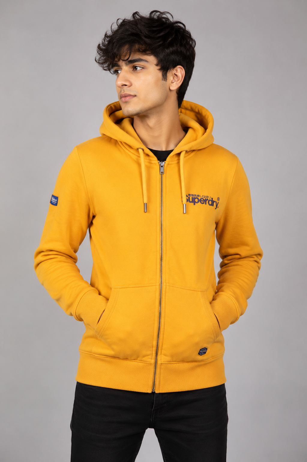 SUPER DRY men's mustard yellow full-zip graphic hoodie, UK Size S, featuring a purple mountain back print, hood, pockets and ribbed trims.