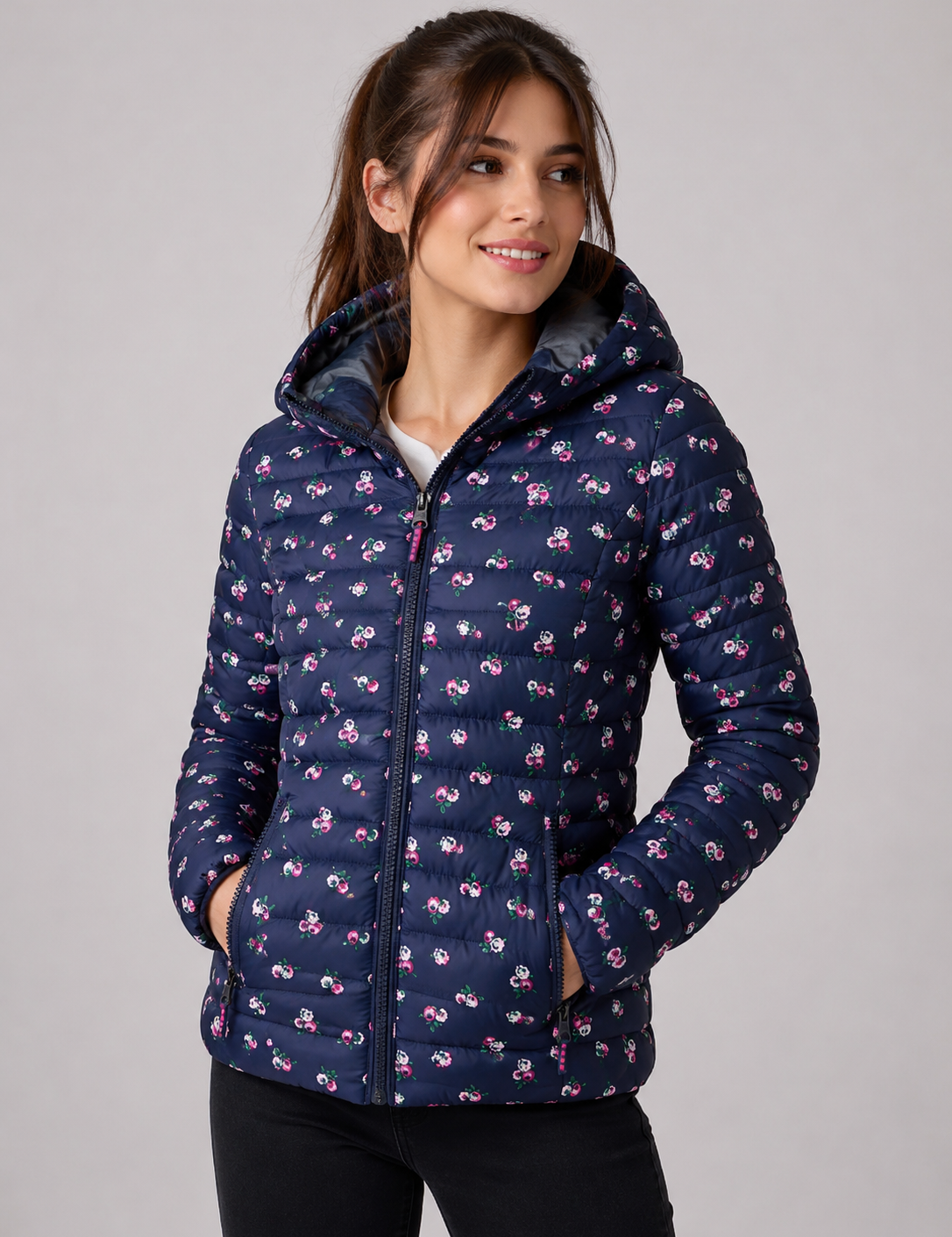 Superdry Women's Navy Floral Hooded Puffer Jacket in UK Size M, featuring a quilted padded design, floral print, hood and zip pockets. Stylish and cosy winter outerwear.