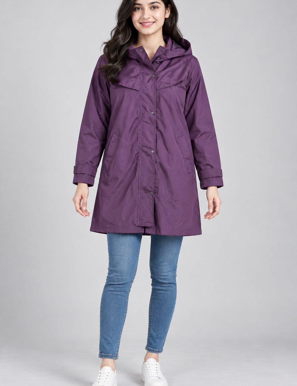   Target Dry women’s purple longline waterproof coat in UK size 14. Smart collar, popper fastening and practical pockets—ideal for rainy days.