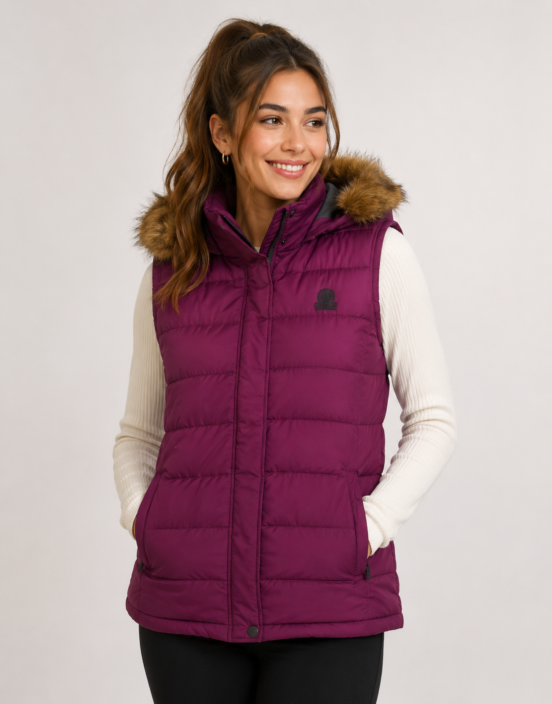 TOG 24 women's purple puffer gilet, UK size 18, with a cosy faux-fur-trimmed hood, quilted padding and practical pockets. Stylish winter layering piece.