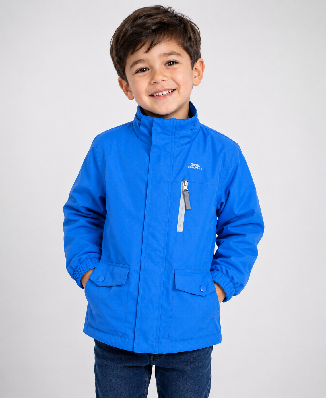  Trespass Kids Blue Waterproof Rain Jacket. Lightweight, windproof and water-resistant with zip pocket, flap pockets and a comfortable fit. Perfect for outdoor adventures, school and everyday wear. UK HandPicked.