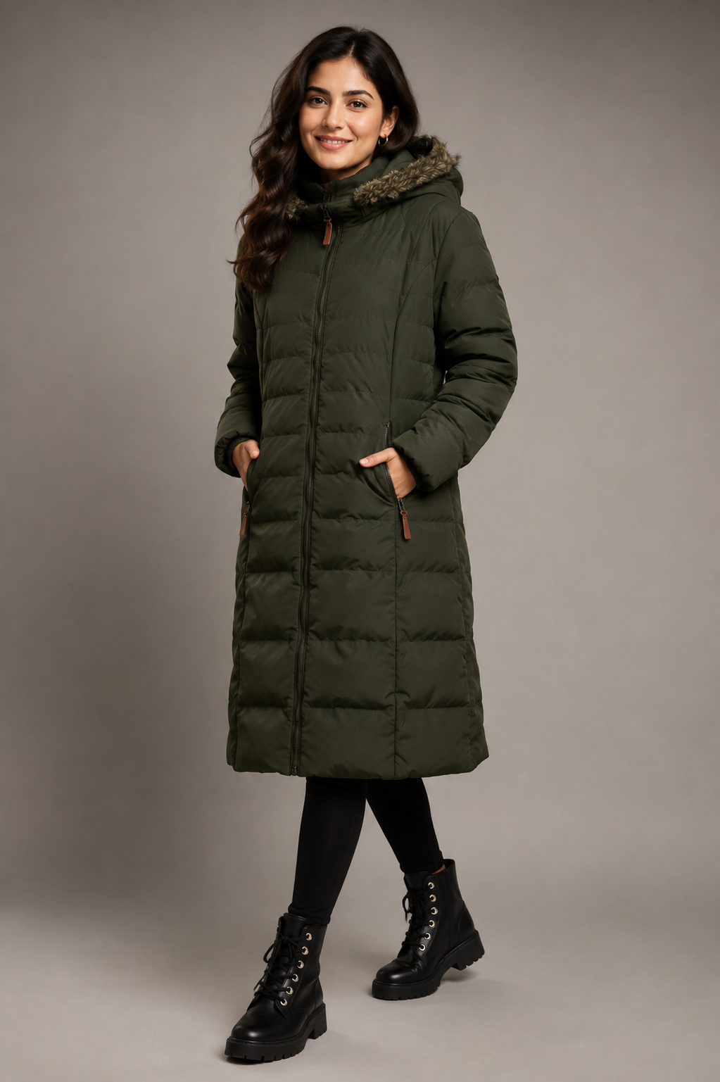  Trespass women’s olive green long puffer coat, UK size L, featuring a warm quilted design, faux-fur hood and zipped pockets. Perfect for winter.