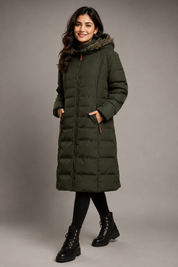  Trespass women’s olive green long puffer coat, UK size L, featuring a warm quilted design, faux-fur hood and zipped pockets. Perfect for winter.