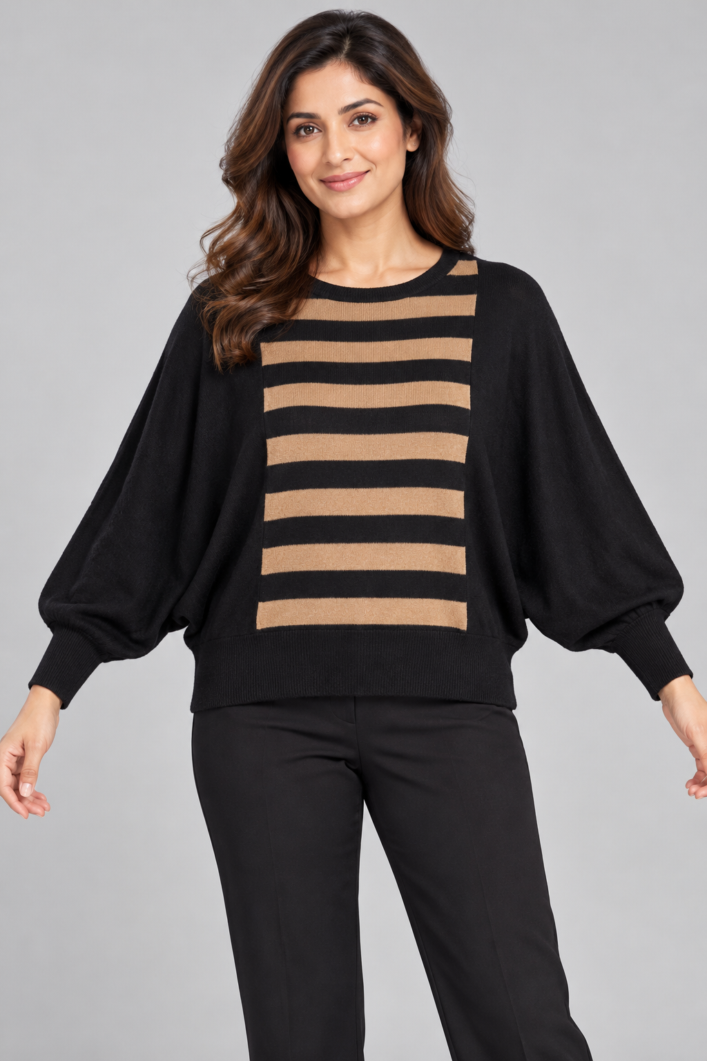   Wallis women’s black and camel striped batwing sweater in UK size M, featuring a relaxed fit, round neckline and ribbed cuffs and hem.