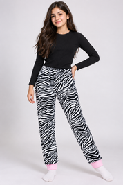 YD girls zebra print jogger trousers in UK Size XS with a 24-inch waist. Black and white animal print with pink cuffs and a cosy relaxed fit.